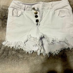 White short shorts. Button fly. High waisted